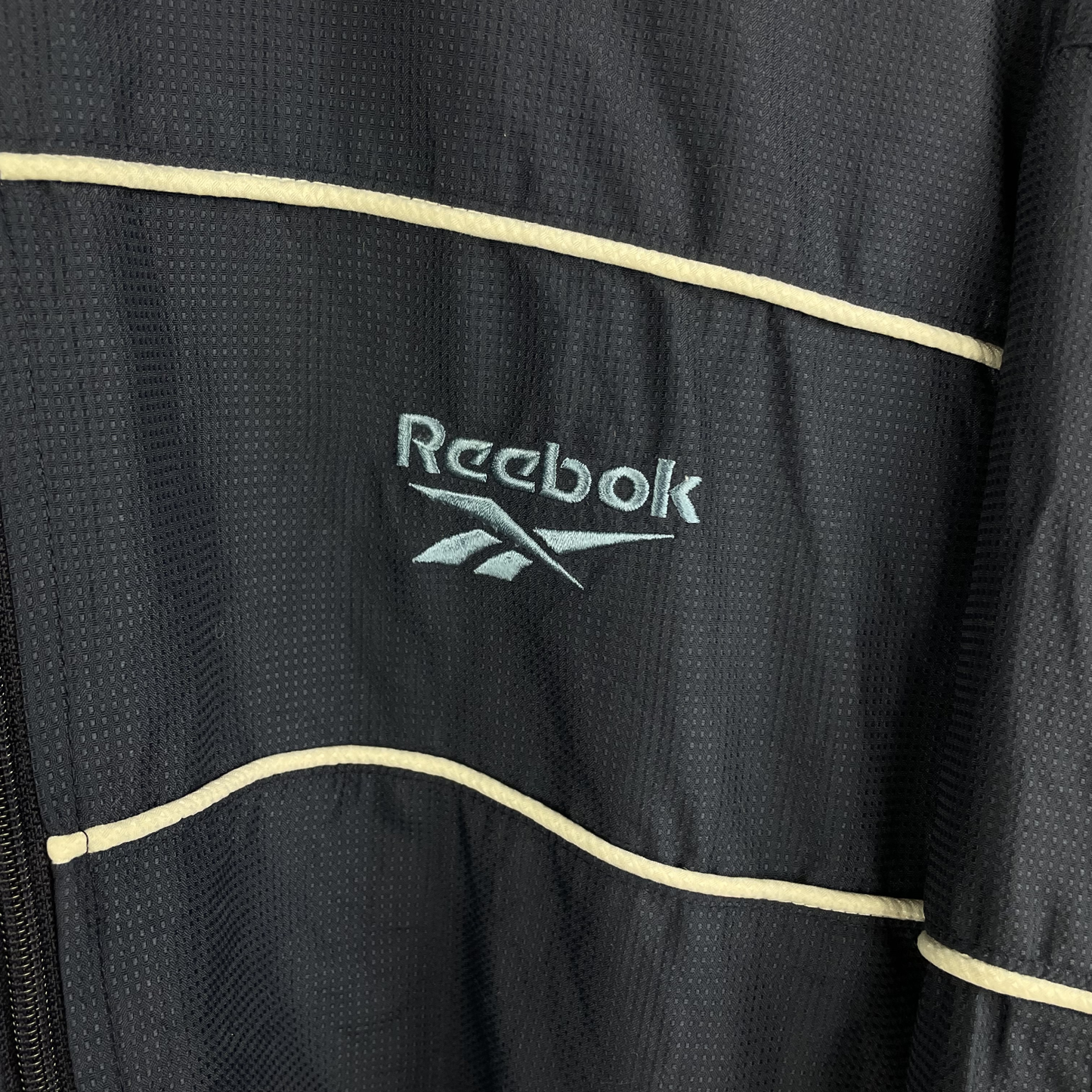 90s Reebok Windbreaker Navy mit Kontrastpaspeln (L)