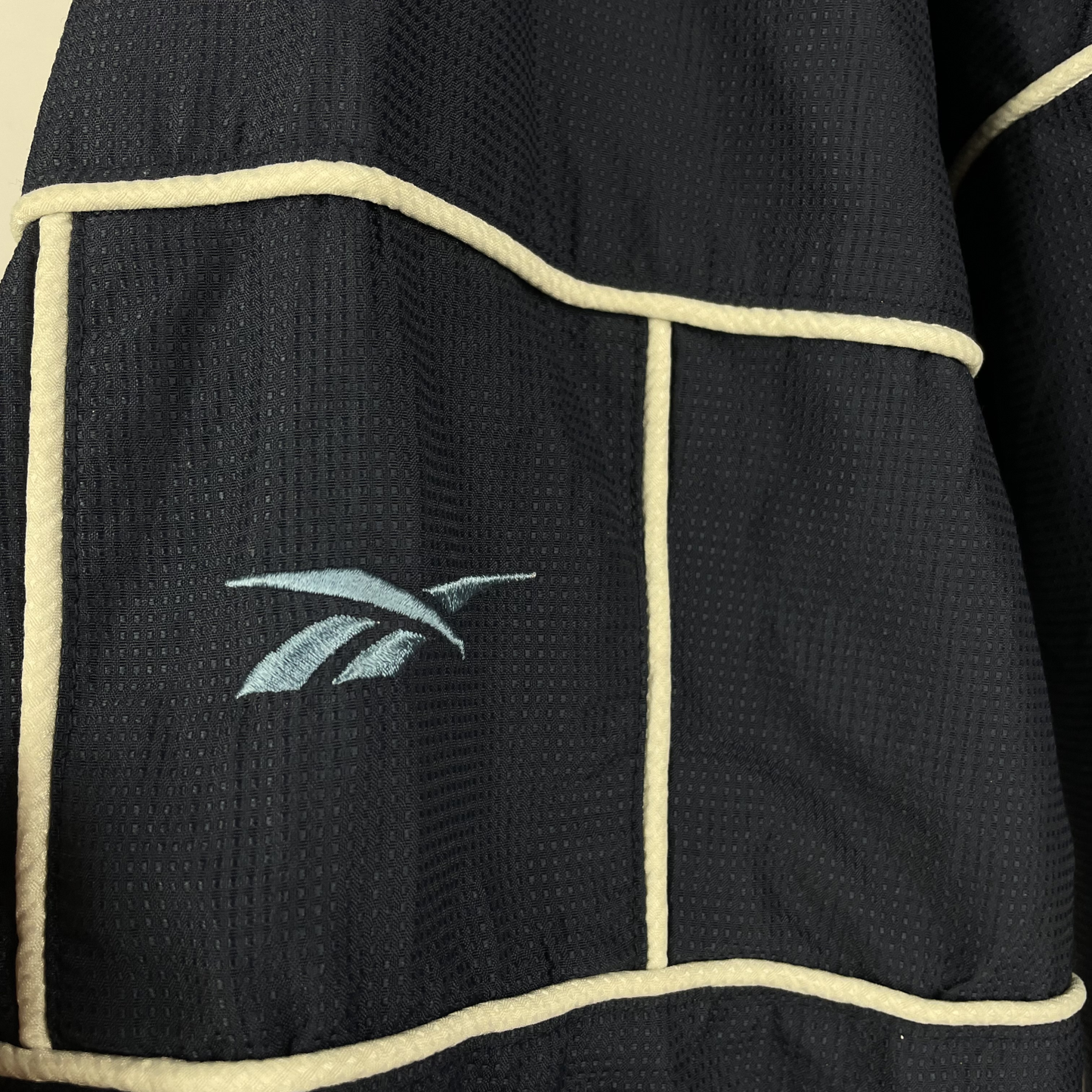 90s Reebok Windbreaker Navy mit Kontrastpaspeln (L)