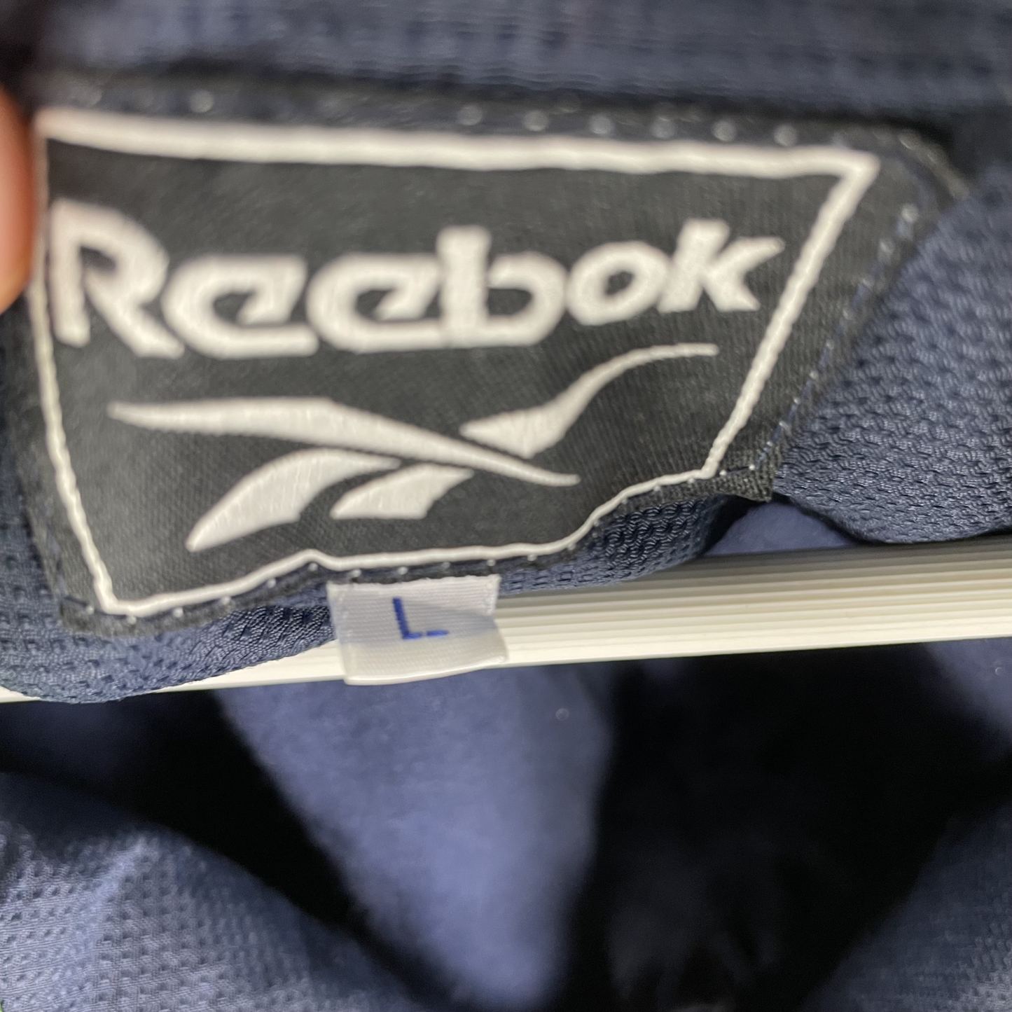 90s Reebok Windbreaker Navy mit Kontrastpaspeln (L)
