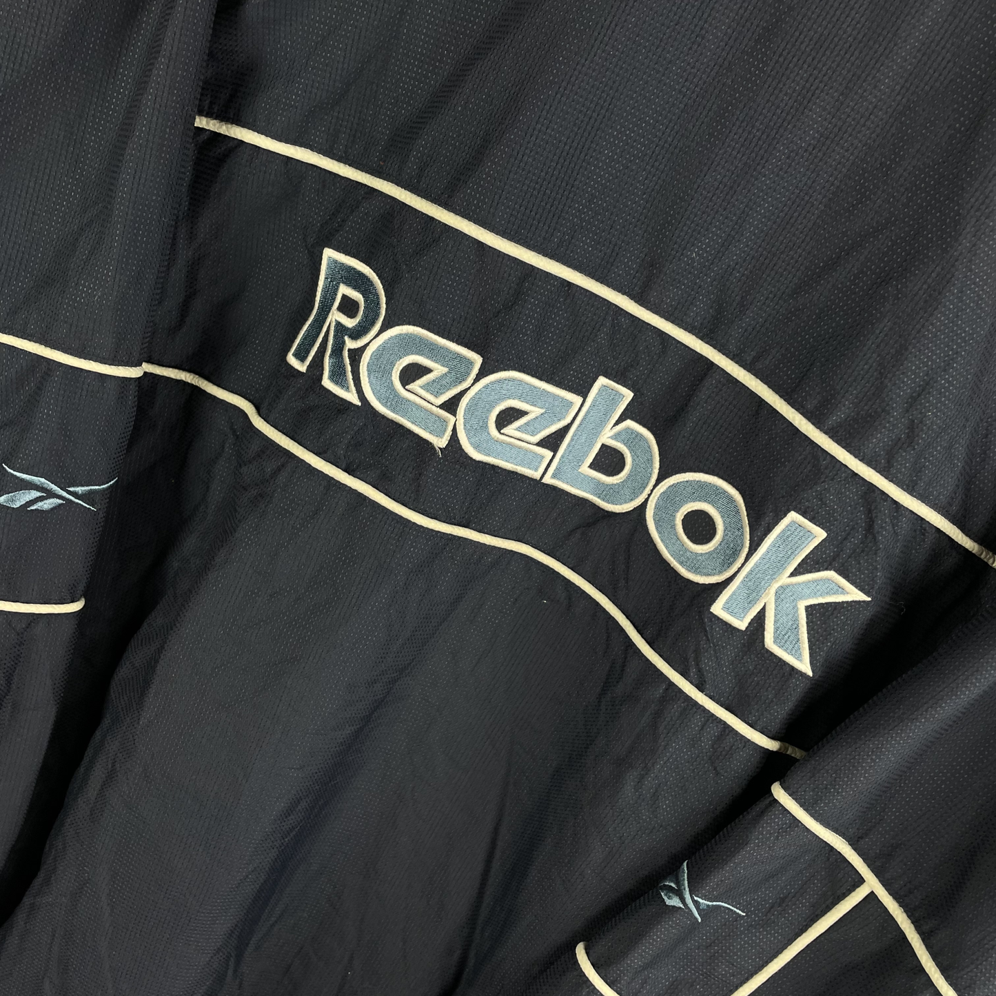 90s Reebok Windbreaker Navy mit Kontrastpaspeln (L)
