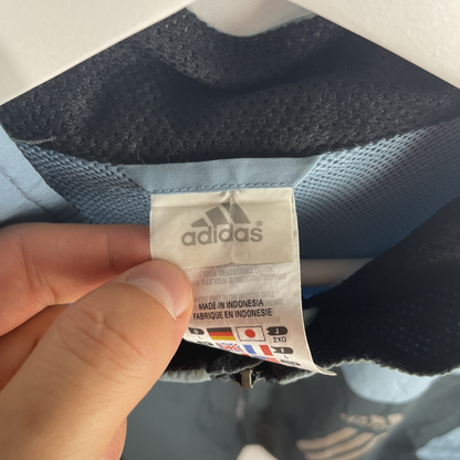 2000s Adidas Laufweste Schwarz/Hellblau Reflektierend (L)